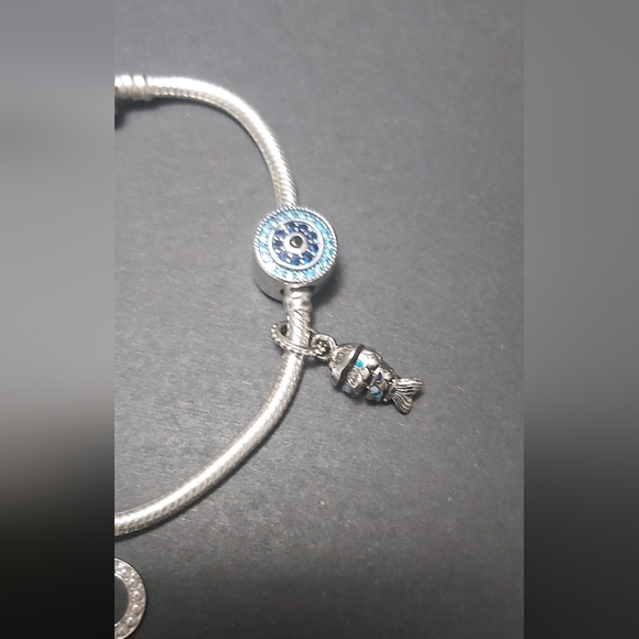 Pandora silver bracelet with four blue charms - Picture 2 of 7